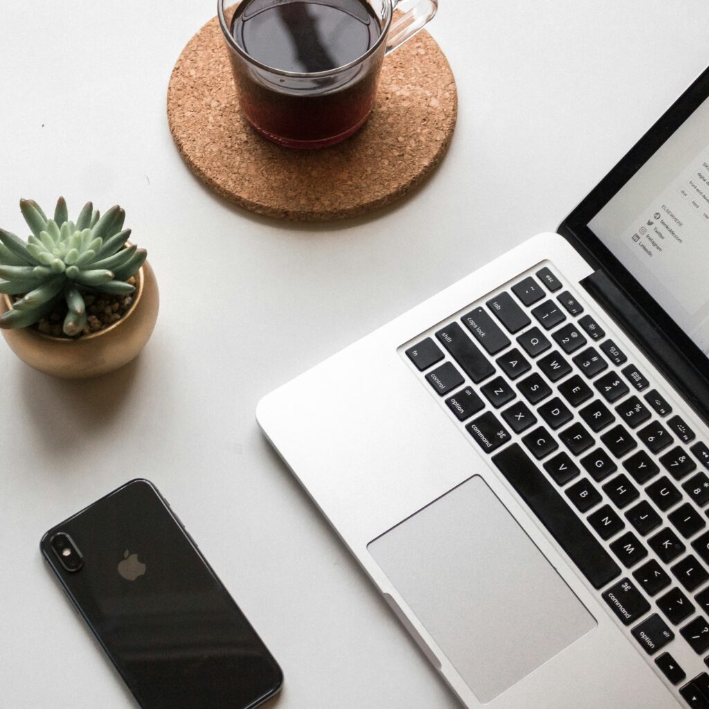 Photo of a laptop on a desk.